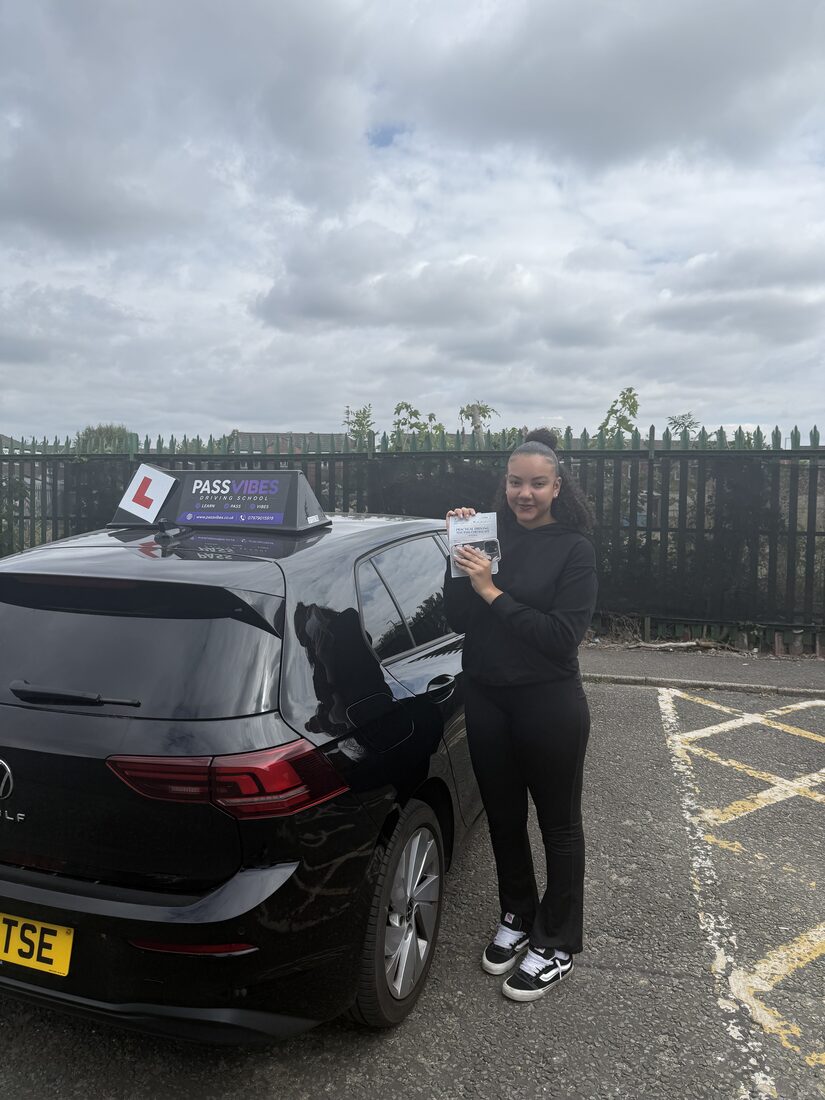PassVibes learner celebrating with their pass certificate after passing their driving test in Greater Manchester